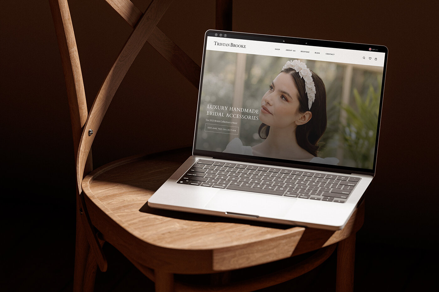 Website design shown on a laptop screen.